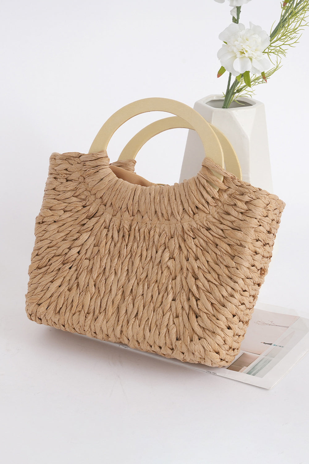 Bolsa de praia estilo vintage da Shewin com alças redondas e design de palha natural
