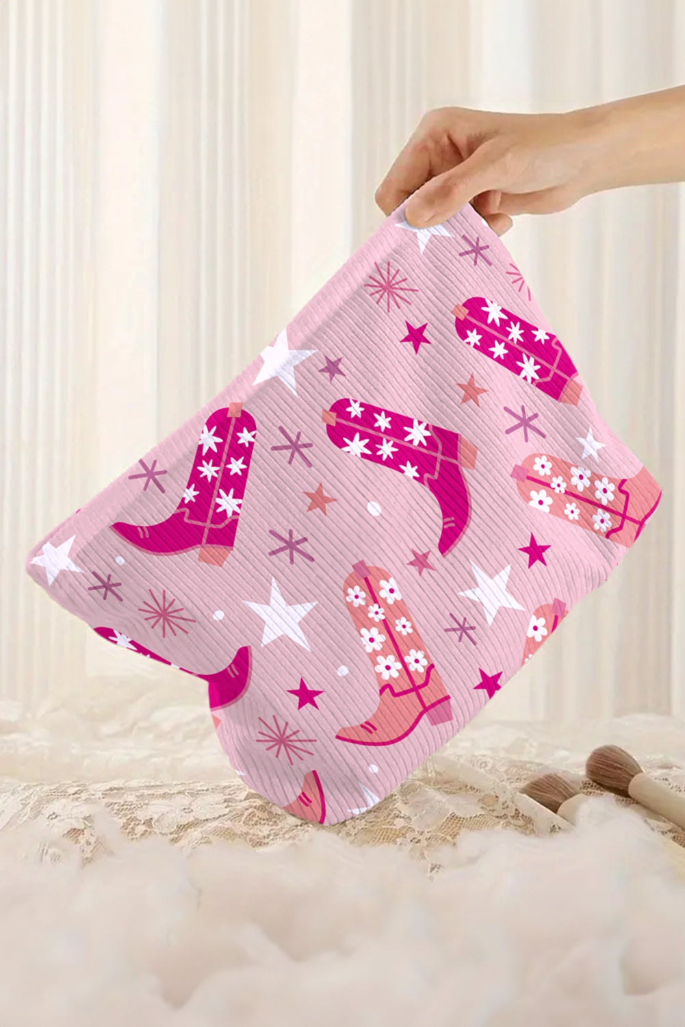 Bolsa de maquiagem rosa cowboy da Shewin com estampa de botas de cowboy em rosa e branco